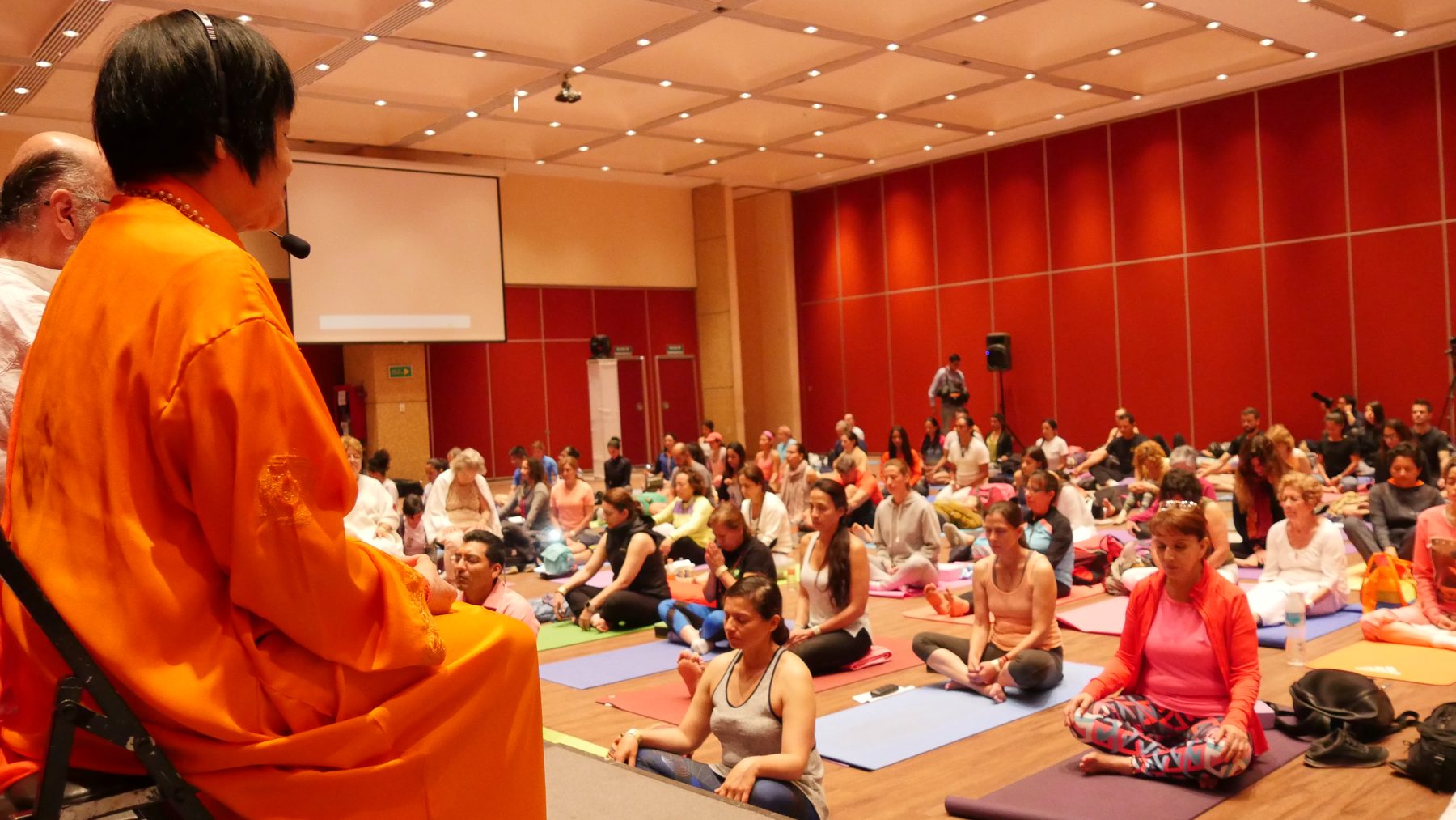 Yogmata guiding an international seminar